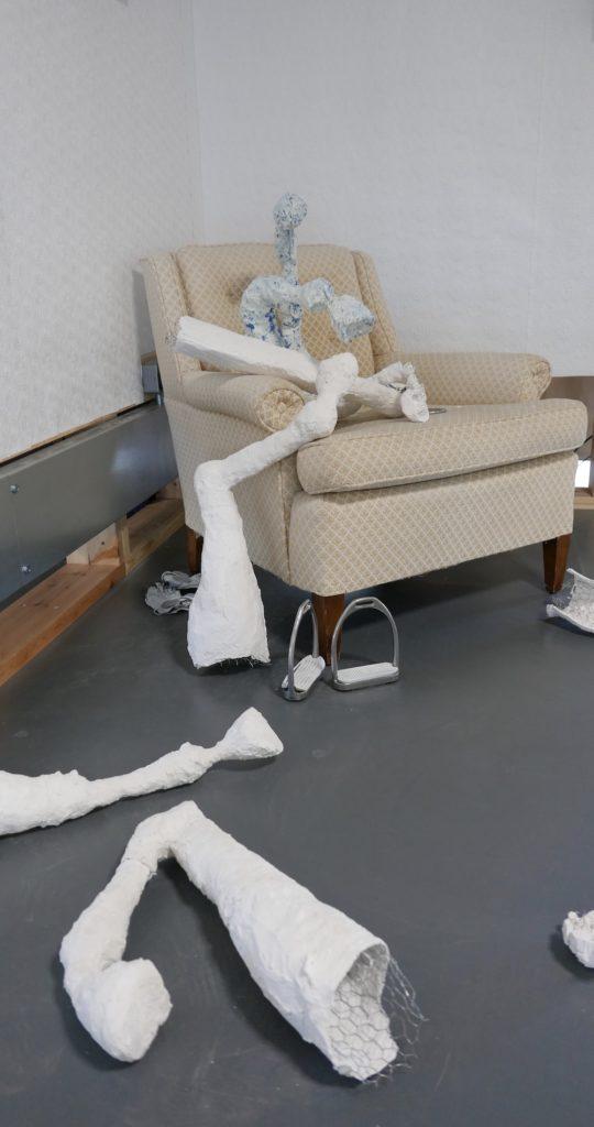 Install view Dining on Leftover Legacy, 2022, Installation components plaster, wire, scrim, silicone, leather, silver.